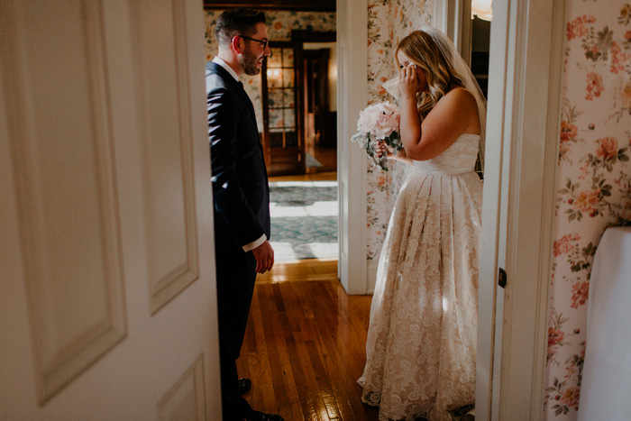 tearful bride seeing groom