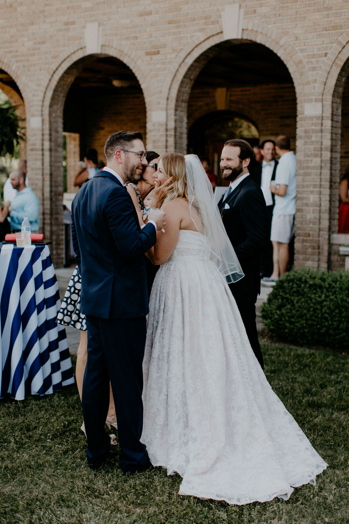 bride and groom at cocktail reception