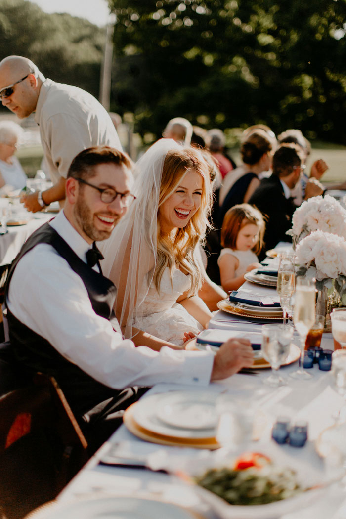 bride and groom at dinner