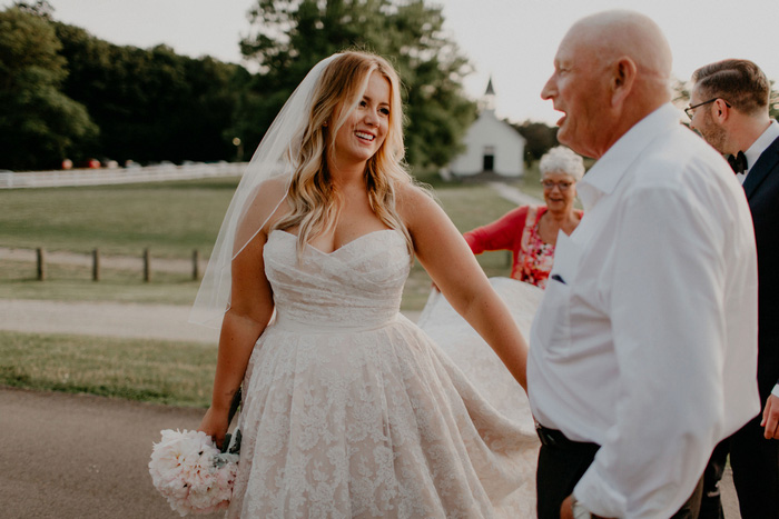 bride speaking to get at reception