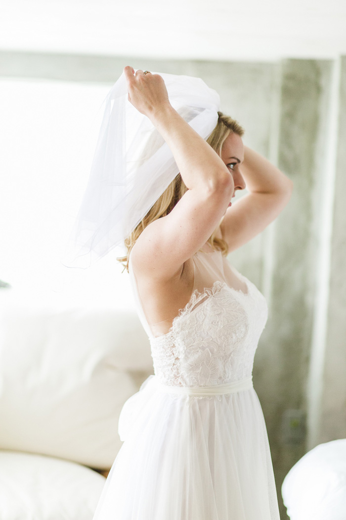 bride adjusting veil