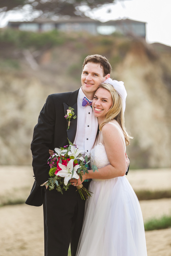 bride and groom portrait on the beach