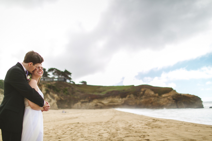 bride and groom portrait on the beach