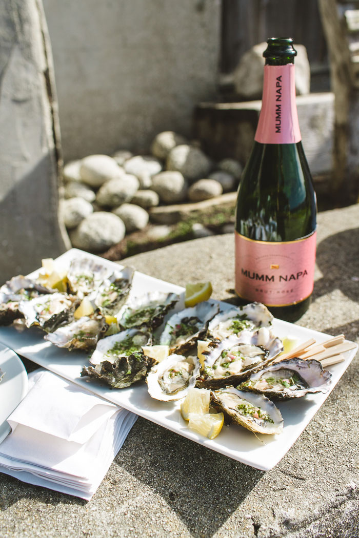 plate of oysters and bottle of champagne 