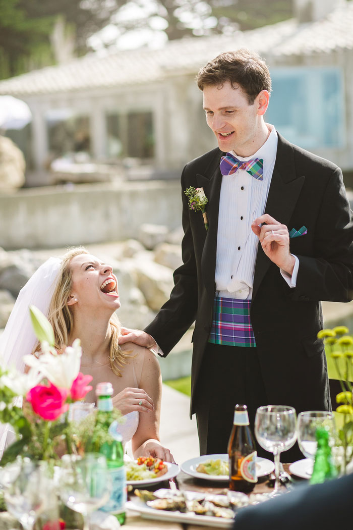 bride laughing at groom's speech