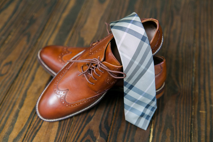 plaid tie and leather dress shoes