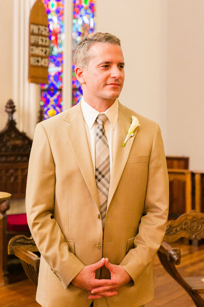 groom waiting at the altar