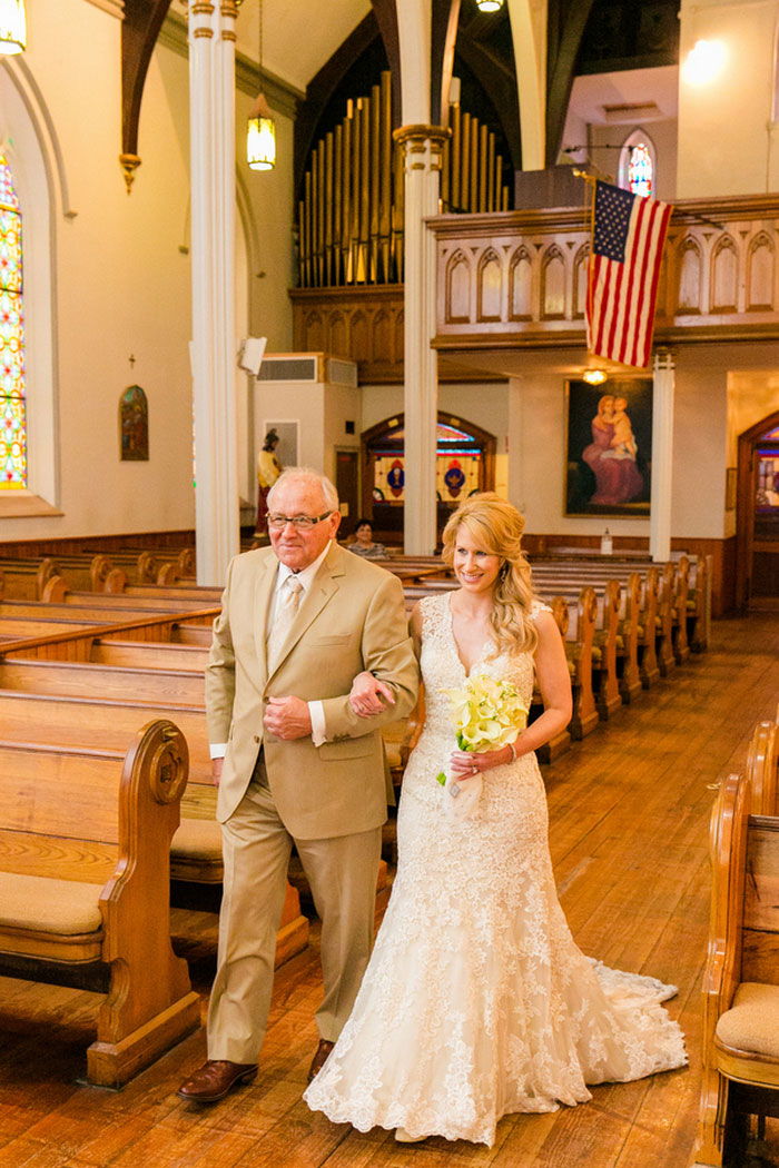 bride and father walking down the aisle