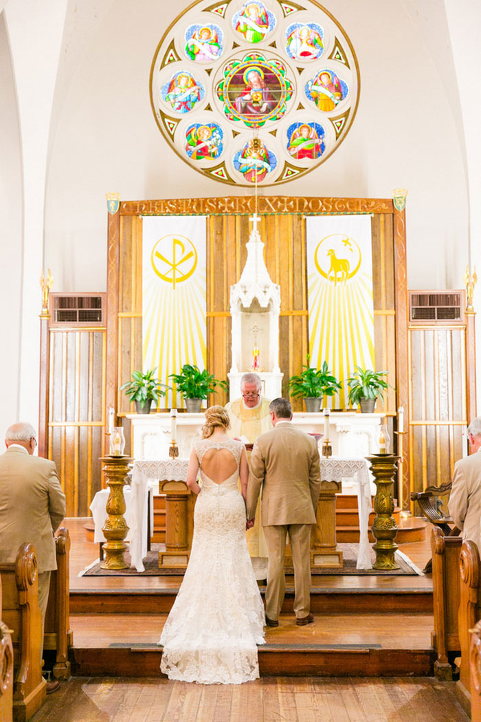 bride and groom at the altar