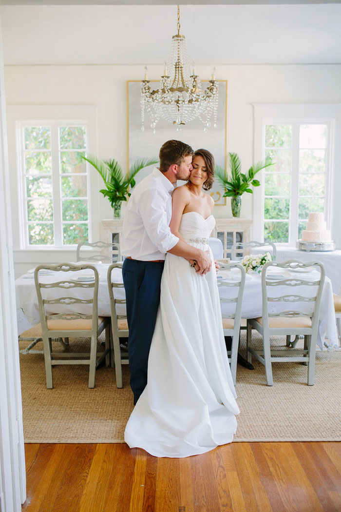 bride and groom portrait in dining room