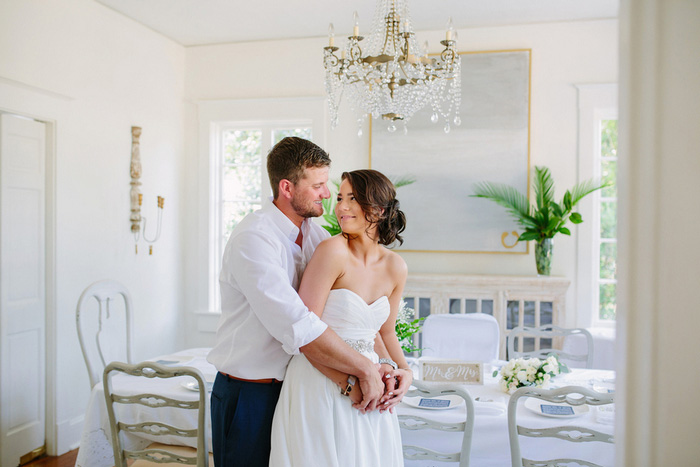 bride and groom portrait in dining room