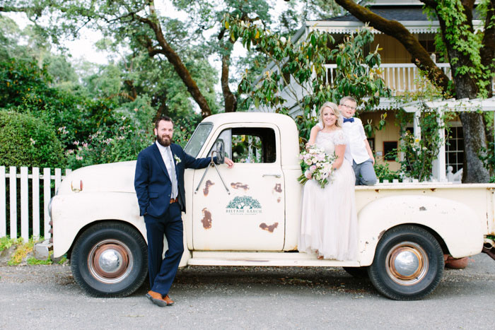 bride and groom portrait with son