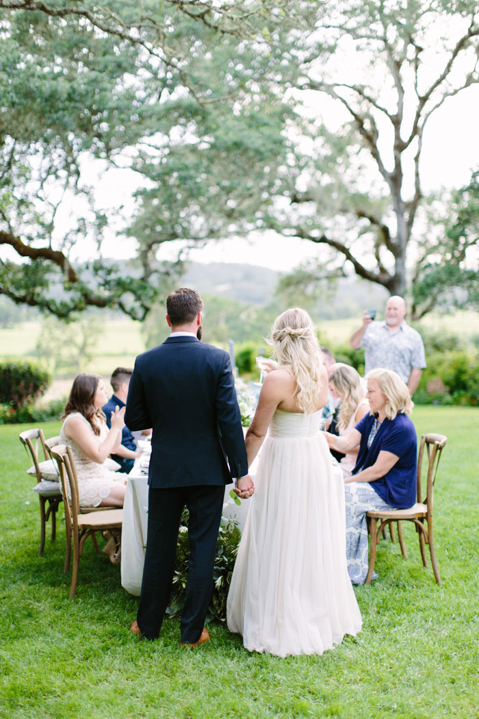 bride and groom giving a speech