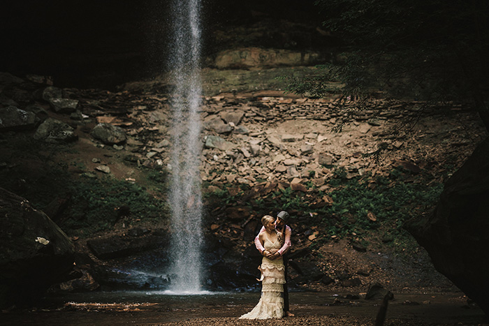 wedding portrait by waterfall