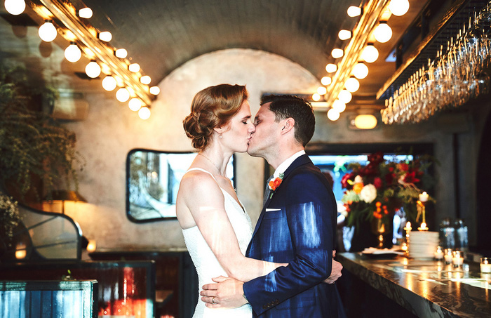 bride and groom kissing