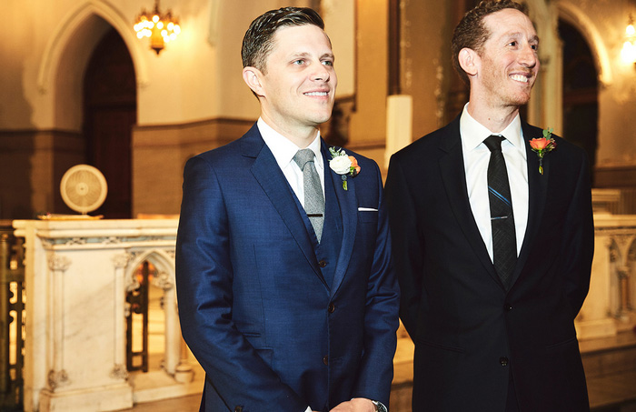 groom waiting at the altar