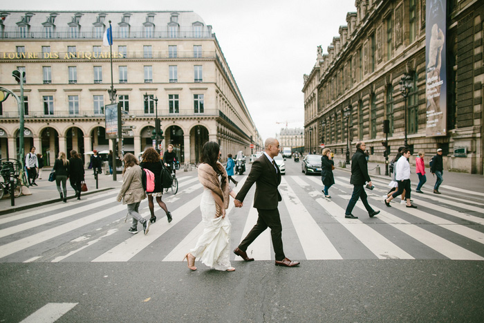 bride and groom crossing the street