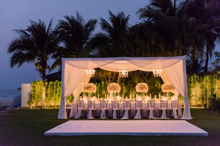 outdoor wedding reception dinner at night