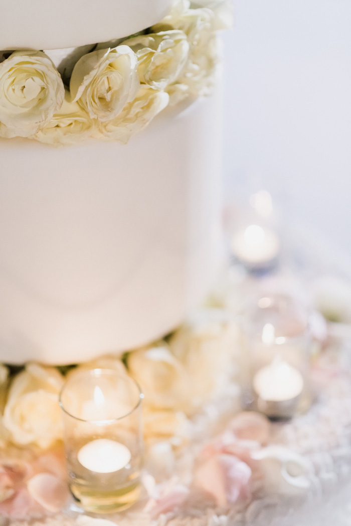 white wedding cake with roses