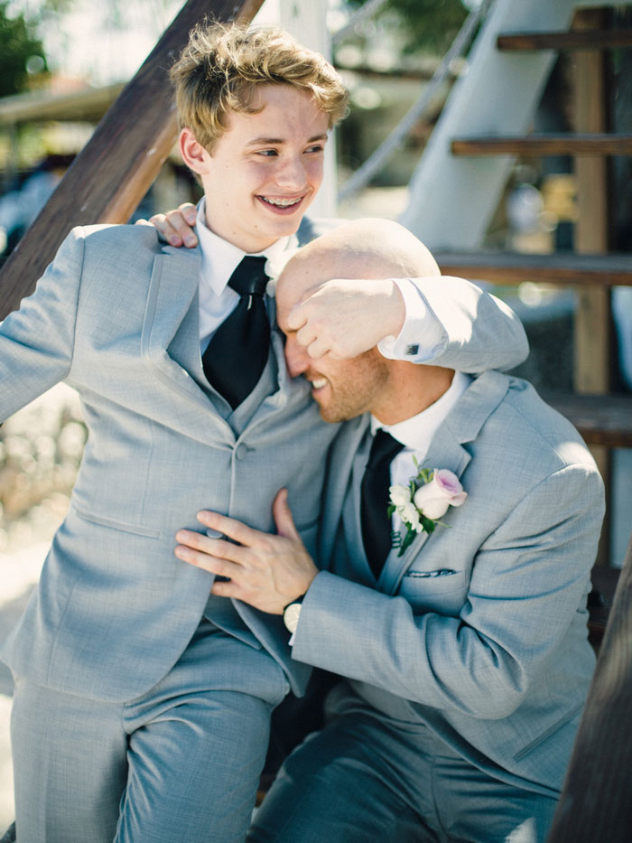 groom and son hugging