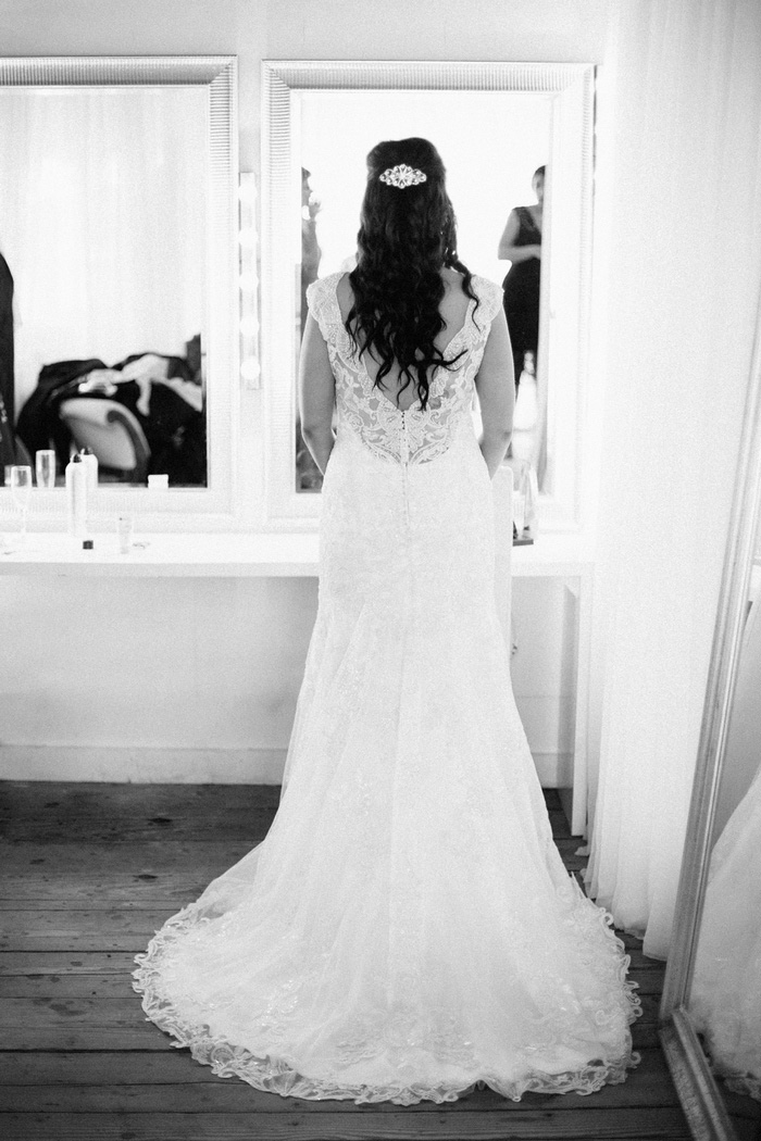 bride looking in the mirror 