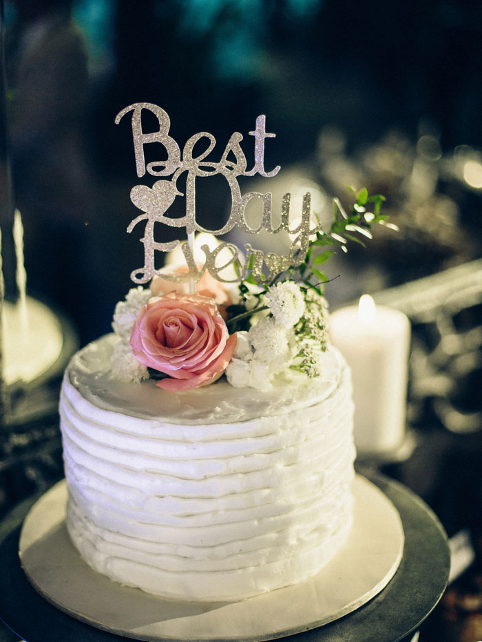 wedding cake with Best Day Ever topper