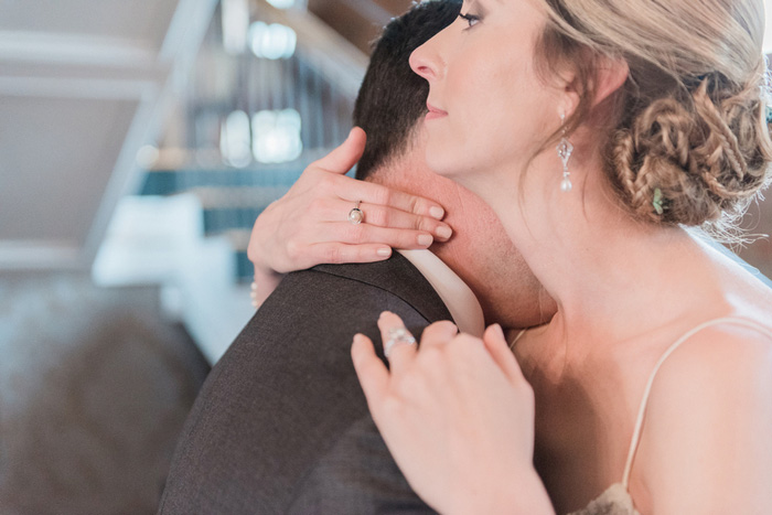 bride hugging groom